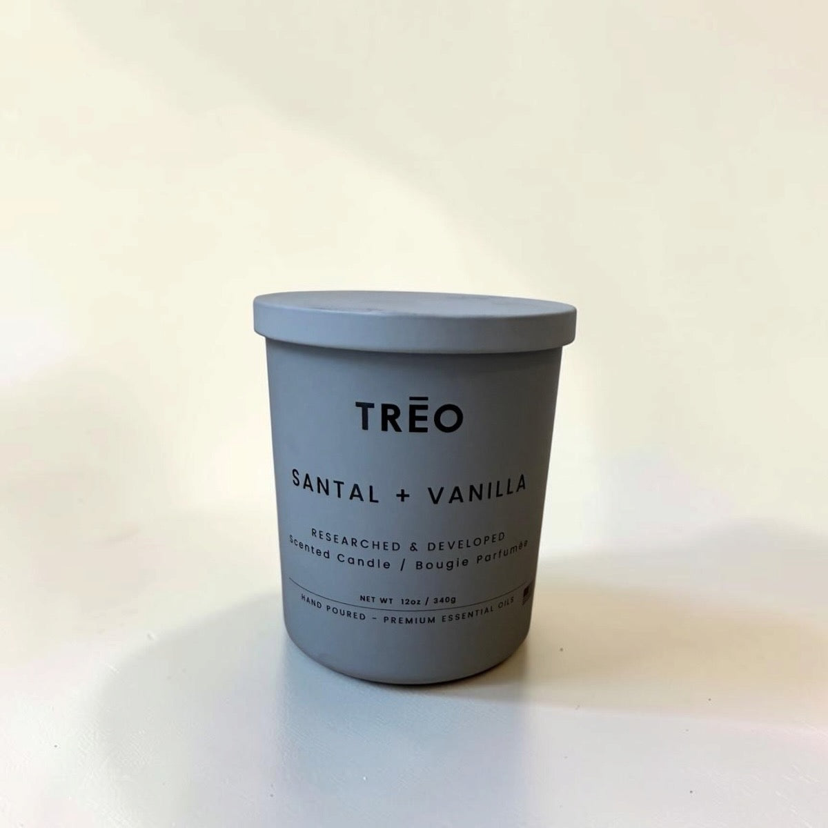TRĒO Santal + Vanilla scented candle, 12 oz, studio photo